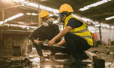 Industry environment impact inspector team work investigate danger chemical oil gas leak with safety face mask