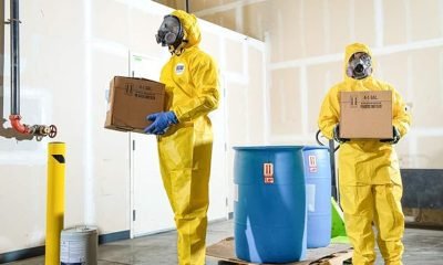 yellow disposable coverall