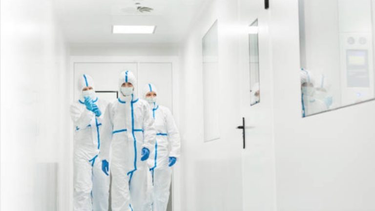 What is the purpose of a clean room suit?