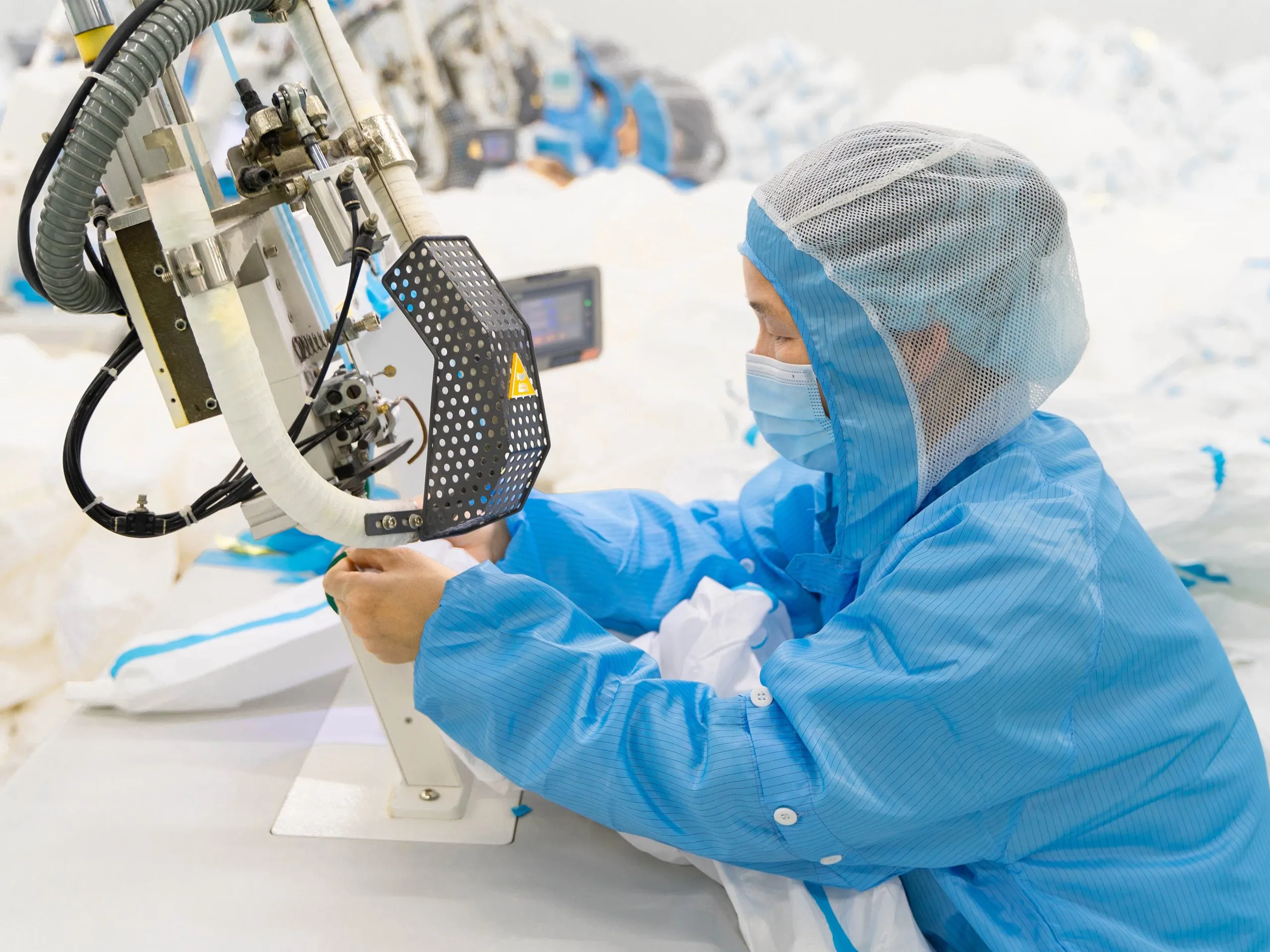 Coverall Manufacturer 61 coverall making scaled