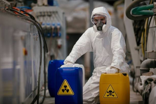 How to Choose Disposable Protective Coveralls for Industrial Use 1 man wearing protective coveralls orig