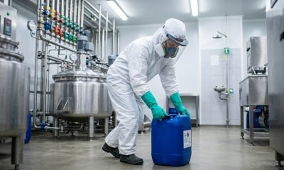 chemical protective coveralls for acid handling